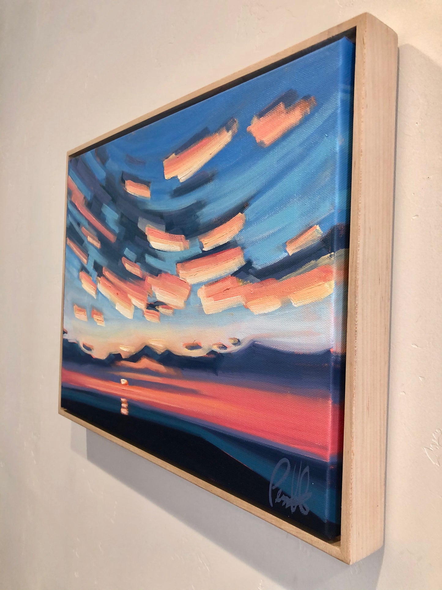 Sunset Casting Incredible Pinks Underneath the Clouds