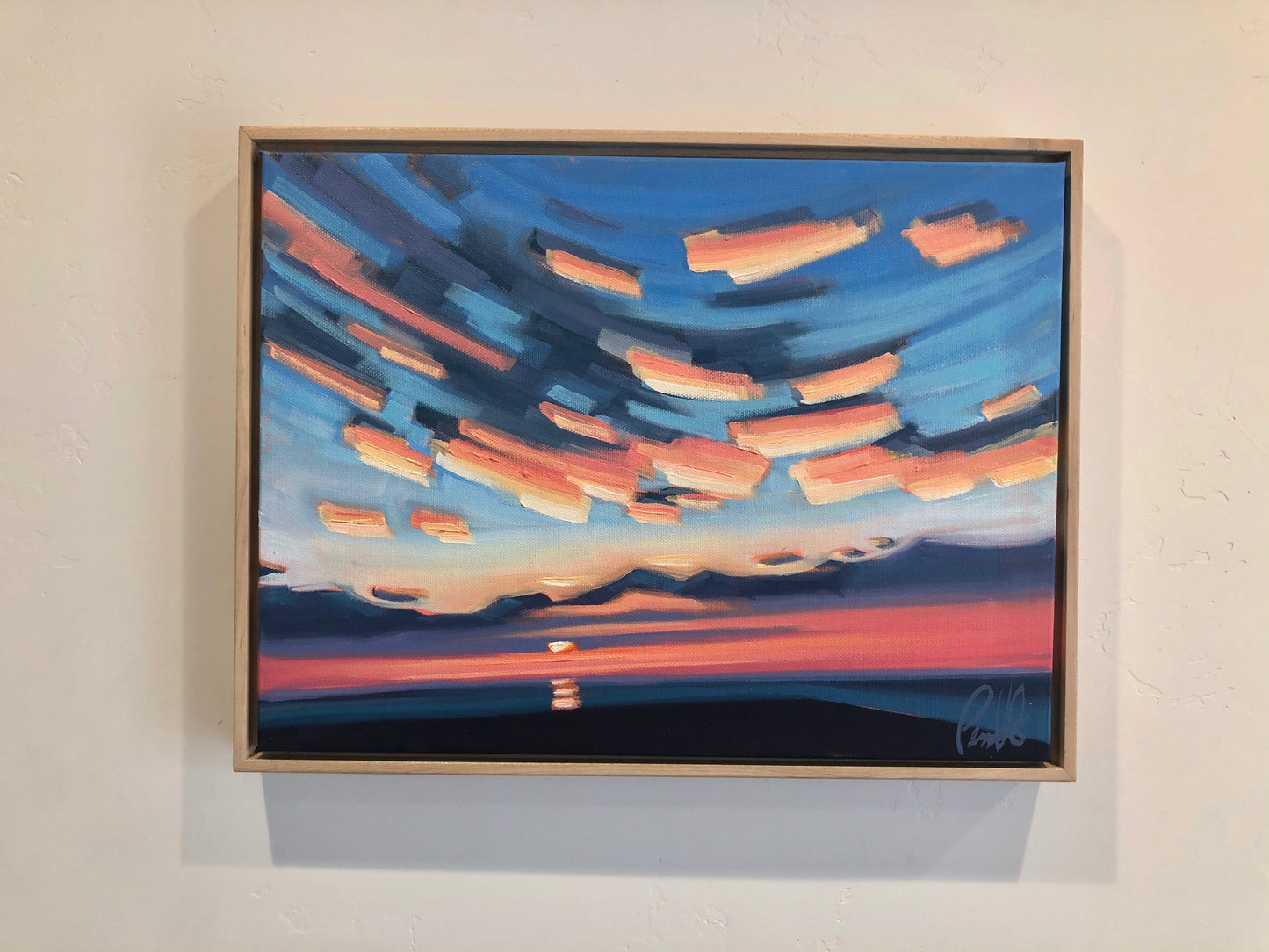 Sunset Casting Incredible Pinks Underneath the Clouds